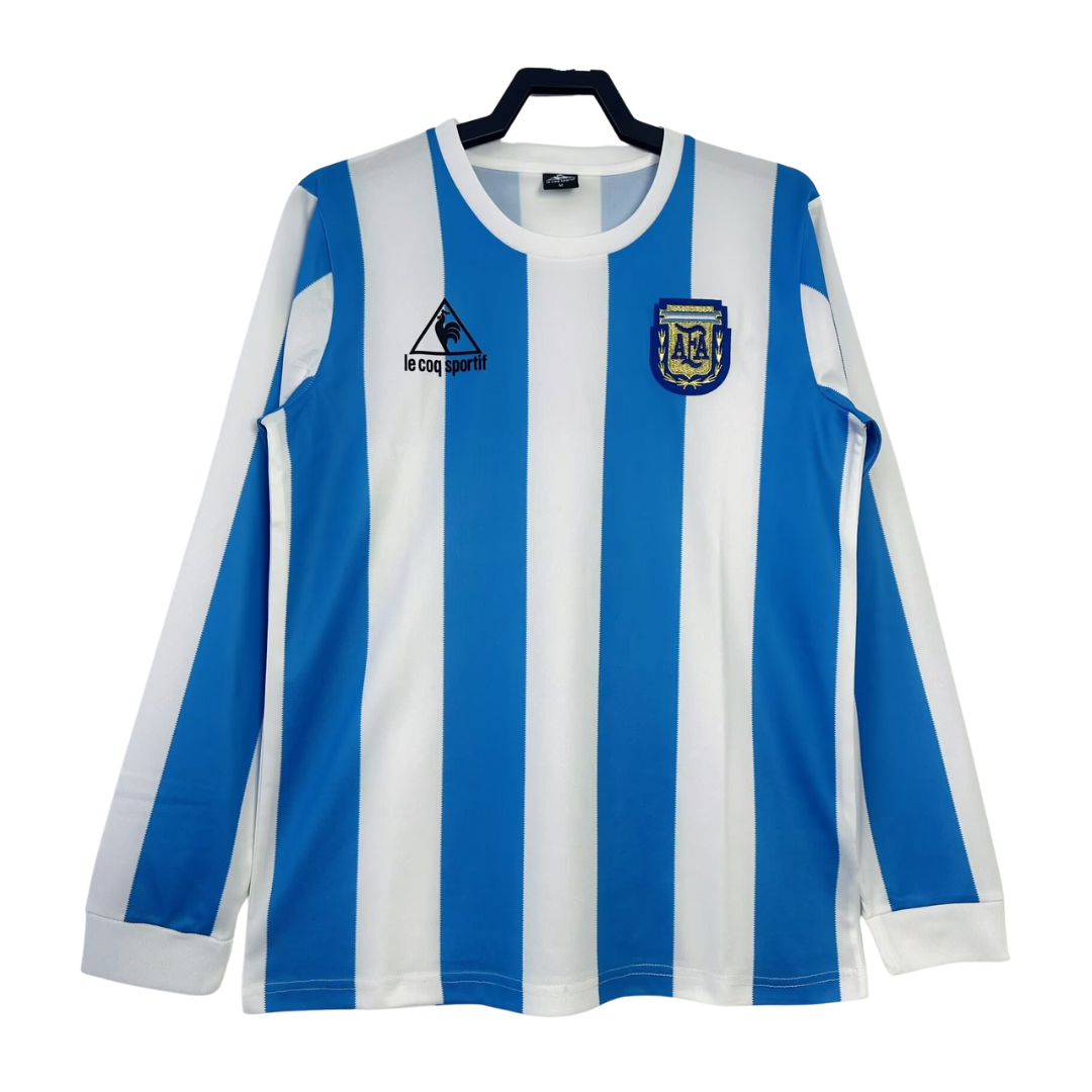 Diego MARADONA. Maillot le Coq Sportif de l'équipe nationale d'Argentine pour la Coupe du Monde... in France Diego MARADONA. Maillot le Coq Sportif de l'équipe nationale d'Argentine pour la Coupe du Monde... in France